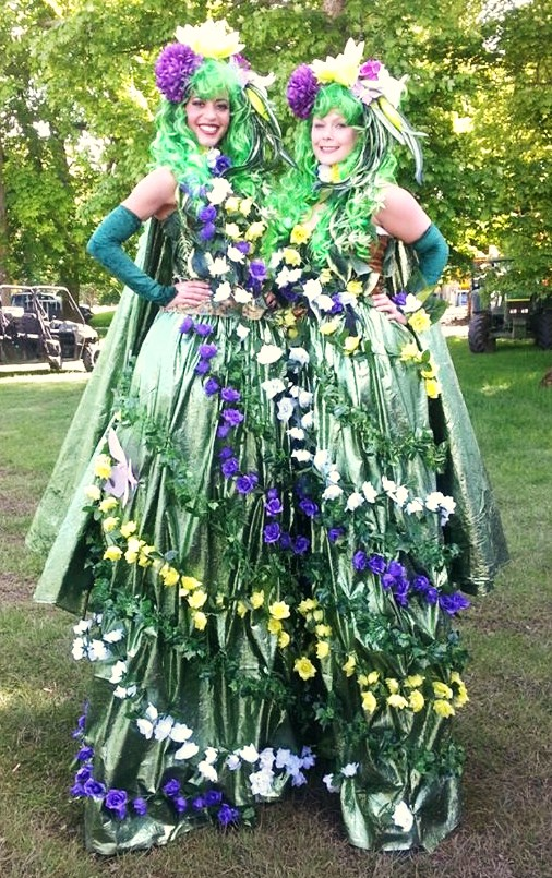 easter spring themed event stiltwalkers